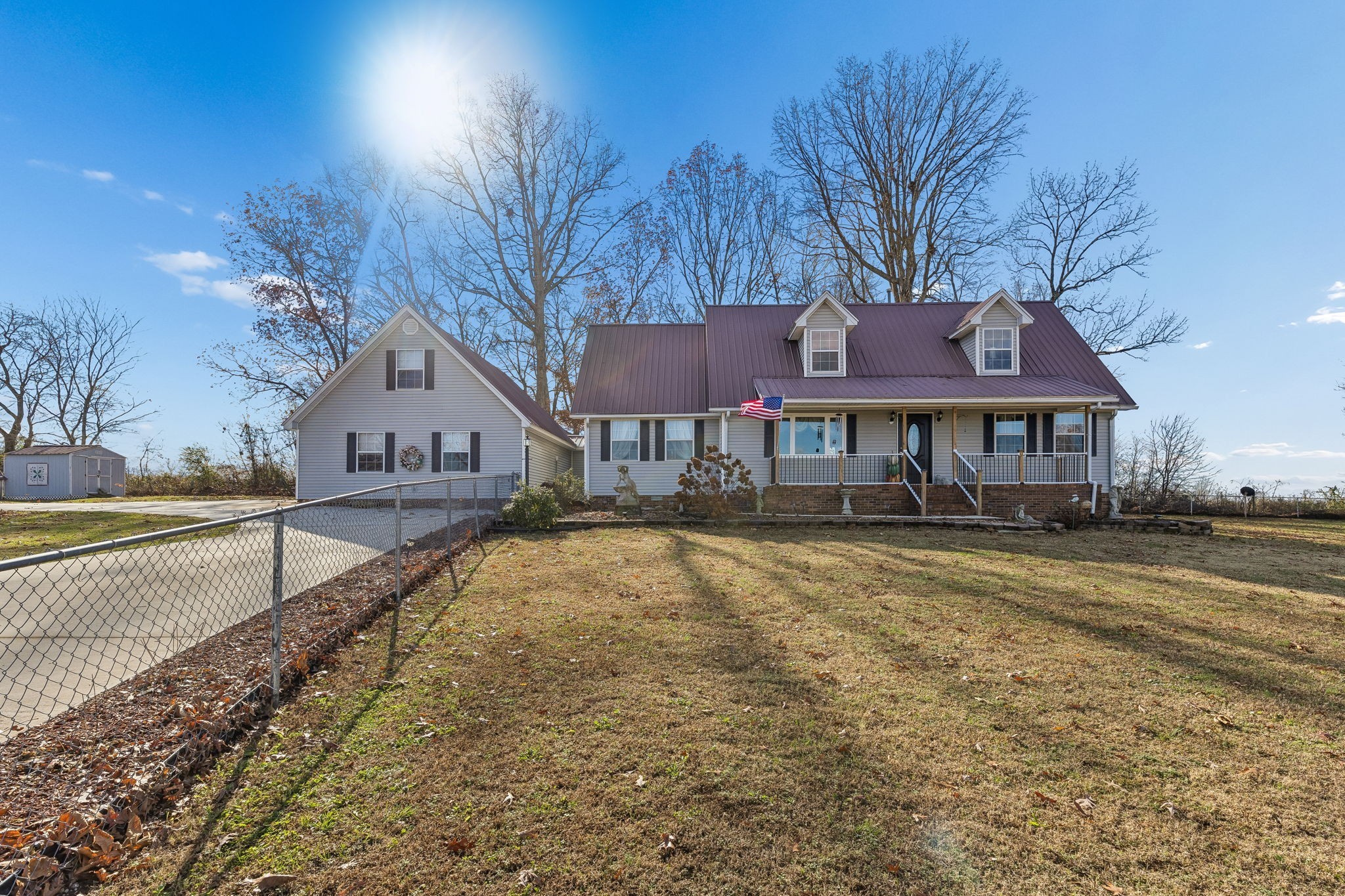 524 Willie Jarvis Road Sparta, TN 38583 - Photo 49 of 64 a front view of a house with a yard and lake view