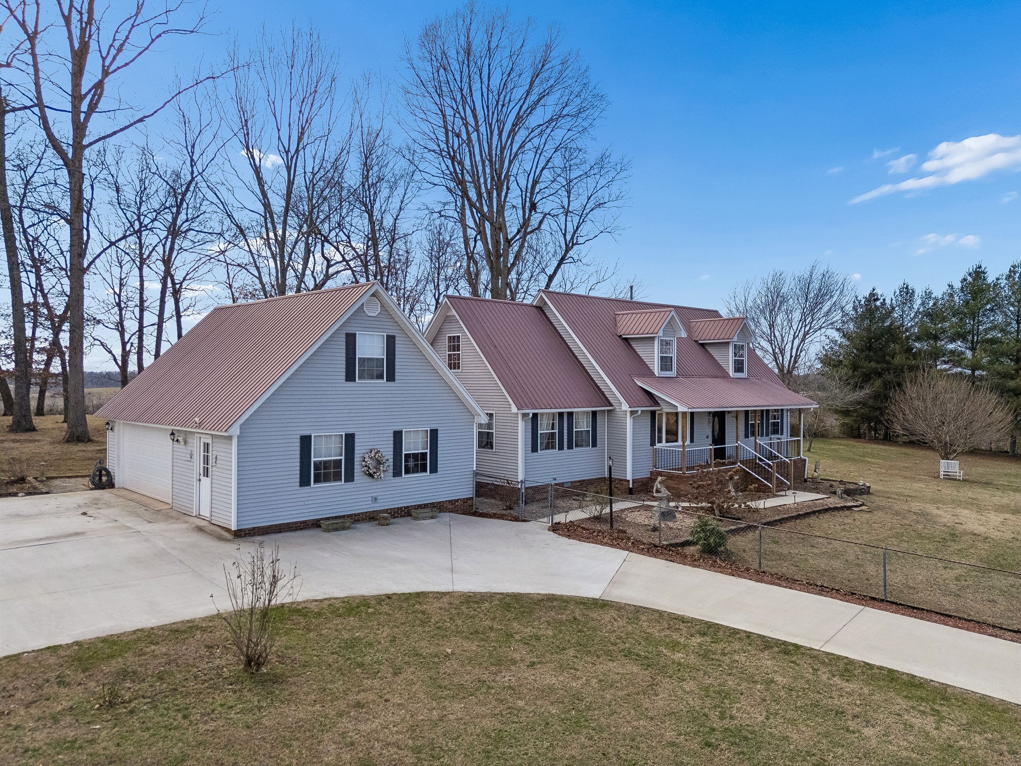 524 Willie Jarvis Road Sparta, TN 38583 - Photo 63 of 64 a white house that has a tree in front of it