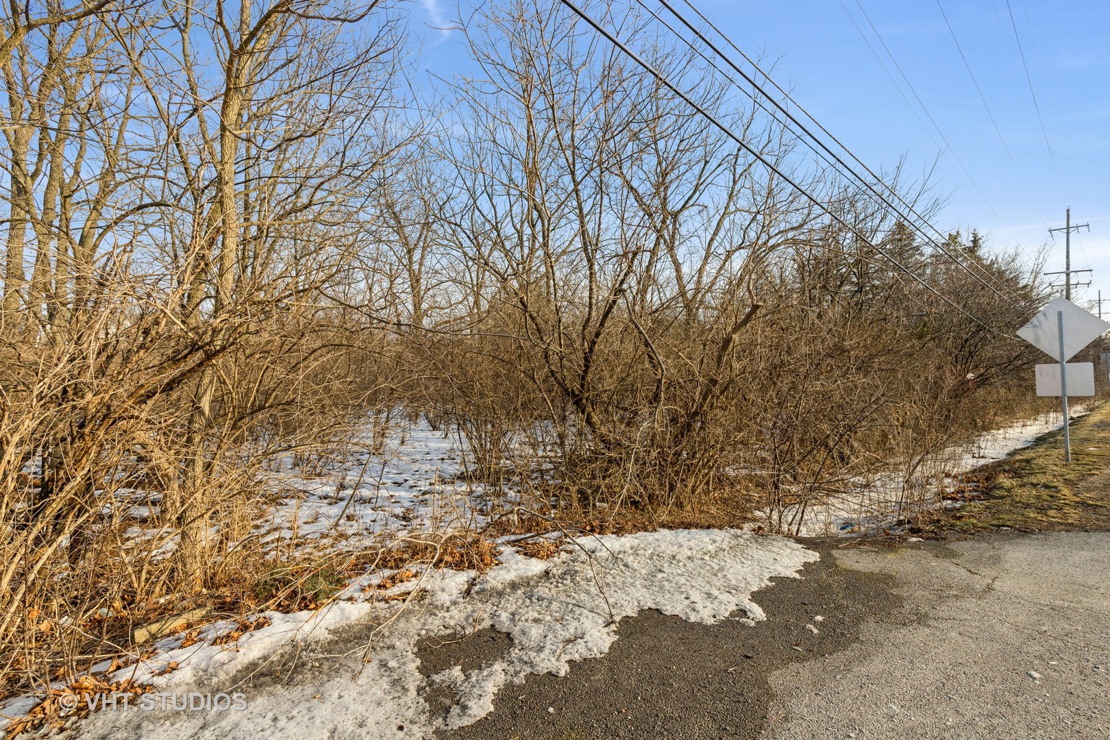 22771 North Prairie Road Lincolnshire, IL 60069 - Photo 4 of 21 a view of snow on the side of a road