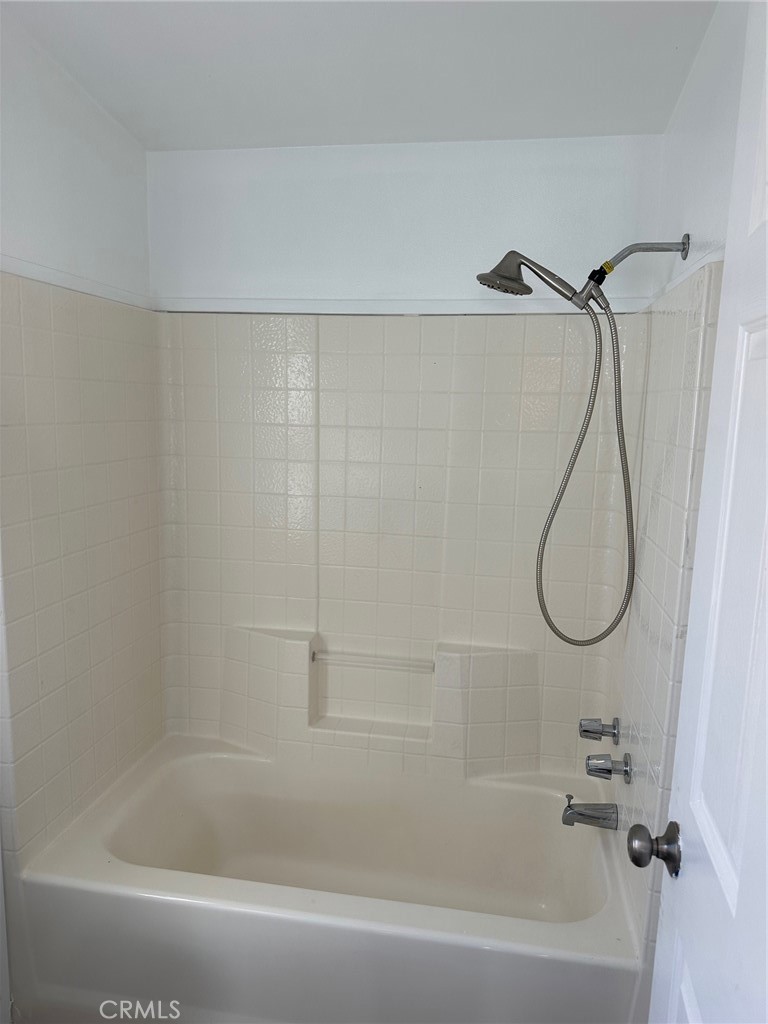 9861 Mission, Unit 14 Riverside, CA 92509 - Photo 19 of 23 a bathroom with a bath tub and a shower