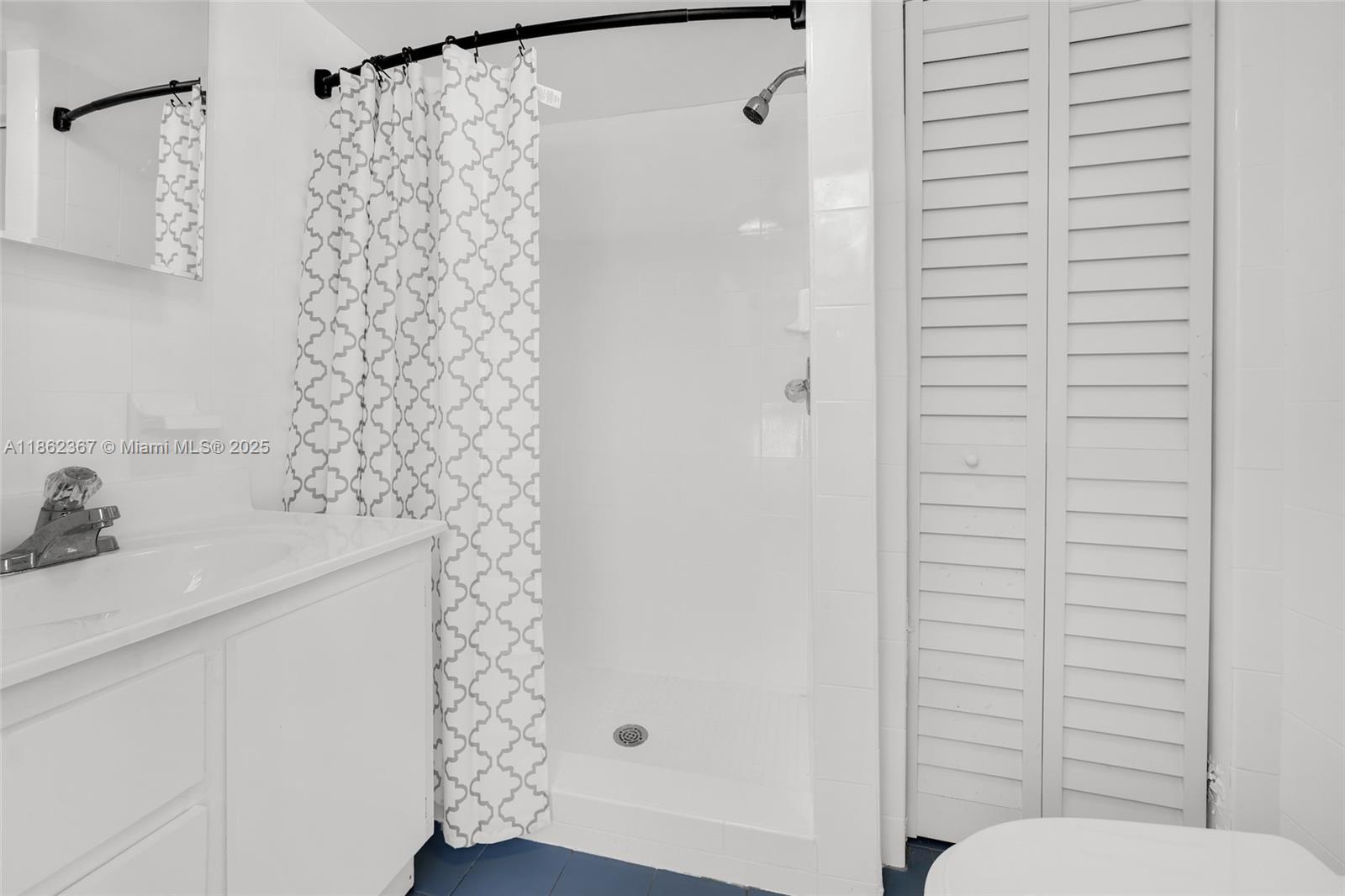 620 Southwest 22nd Road Miami, FL 33129 - Photo 21 of 31 a bathroom with a sink toilet and shower