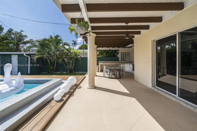 a view of a porch with furniture