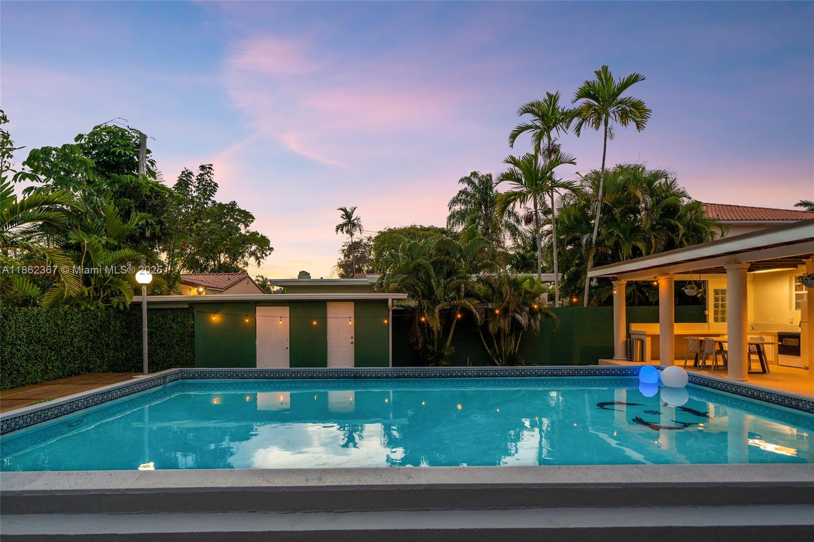620 Southwest 22nd Road Miami, FL 33129 - Photo 27 of 31 a front view of house with yard and green space