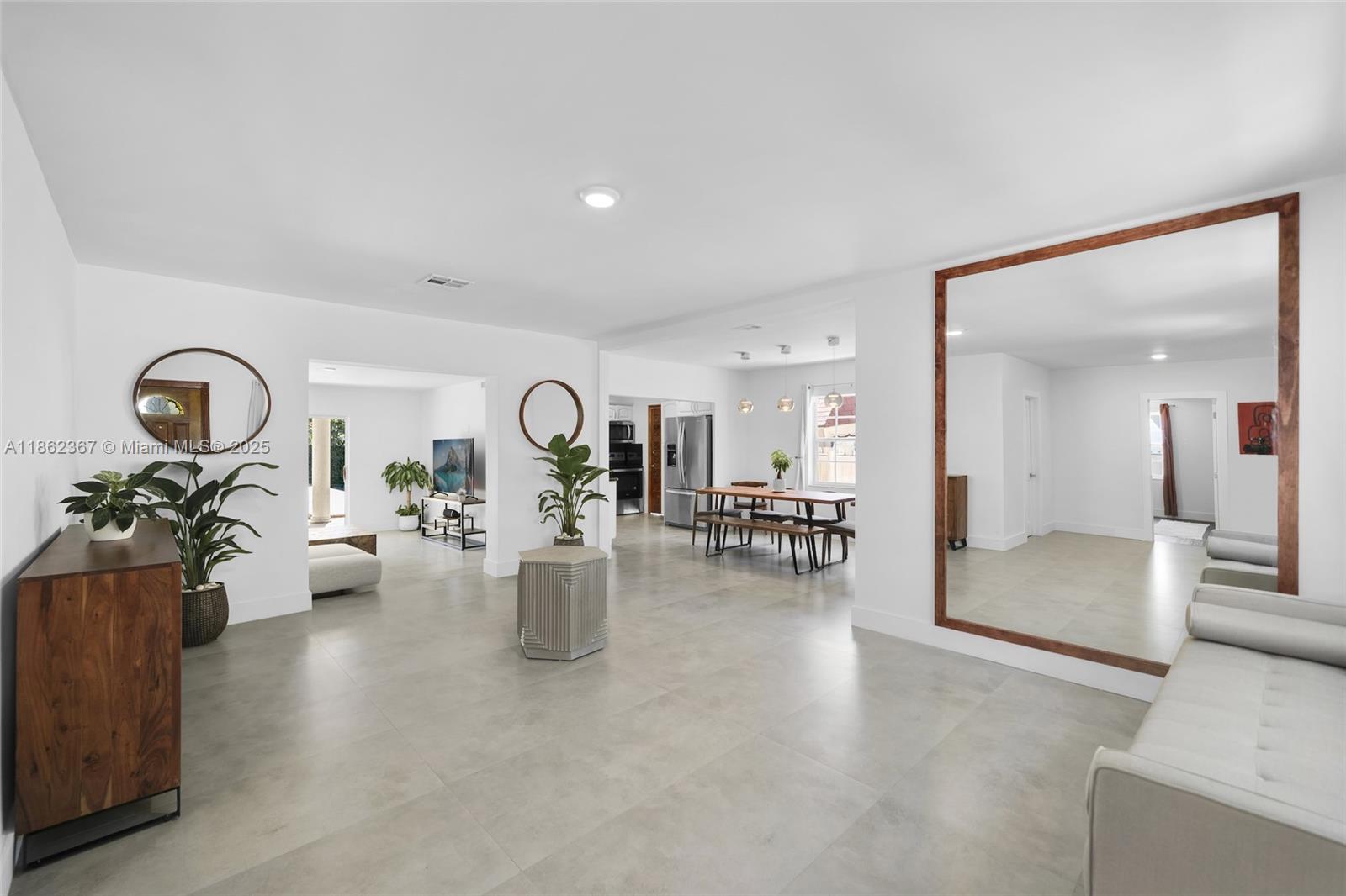 620 Southwest 22nd Road Miami, FL 33129 - Photo 3 of 31 a view of a living room and chandelier