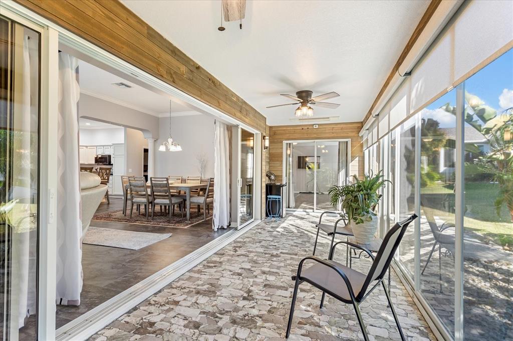566 Allenwood Loop The Villages, FL 32162 - Photo 28 of 32 a view of a living room and dining room