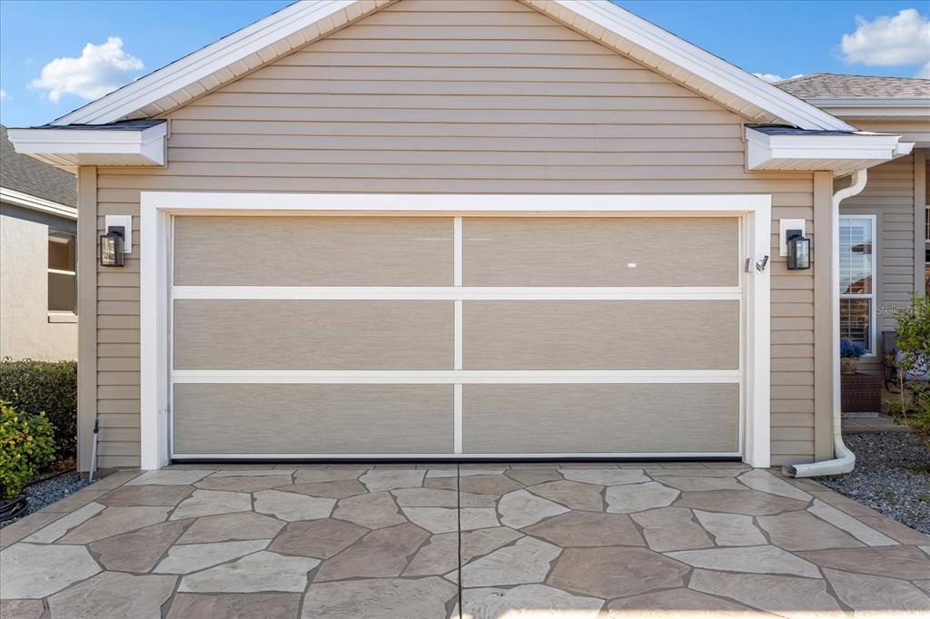 566 Allenwood Loop The Villages, FL 32162 - Photo 31 of 32 a view of a small house with backyard