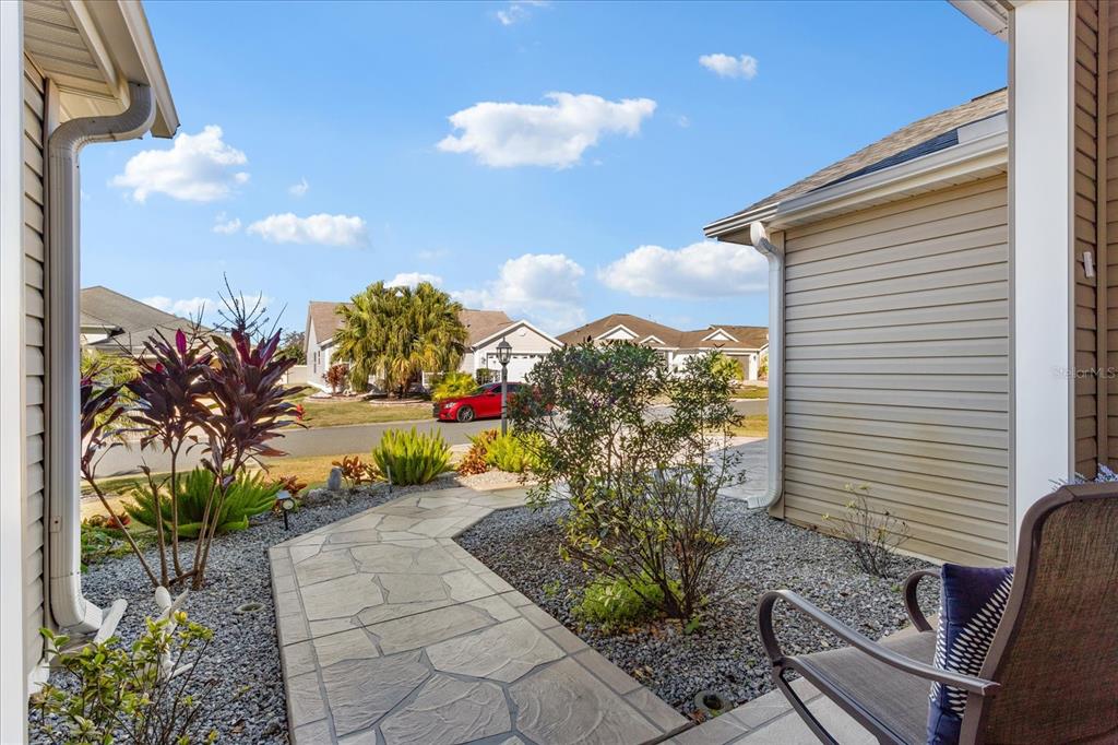 566 Allenwood Loop The Villages, FL 32162 - Photo 4 of 32 a view of a back yard of the house
