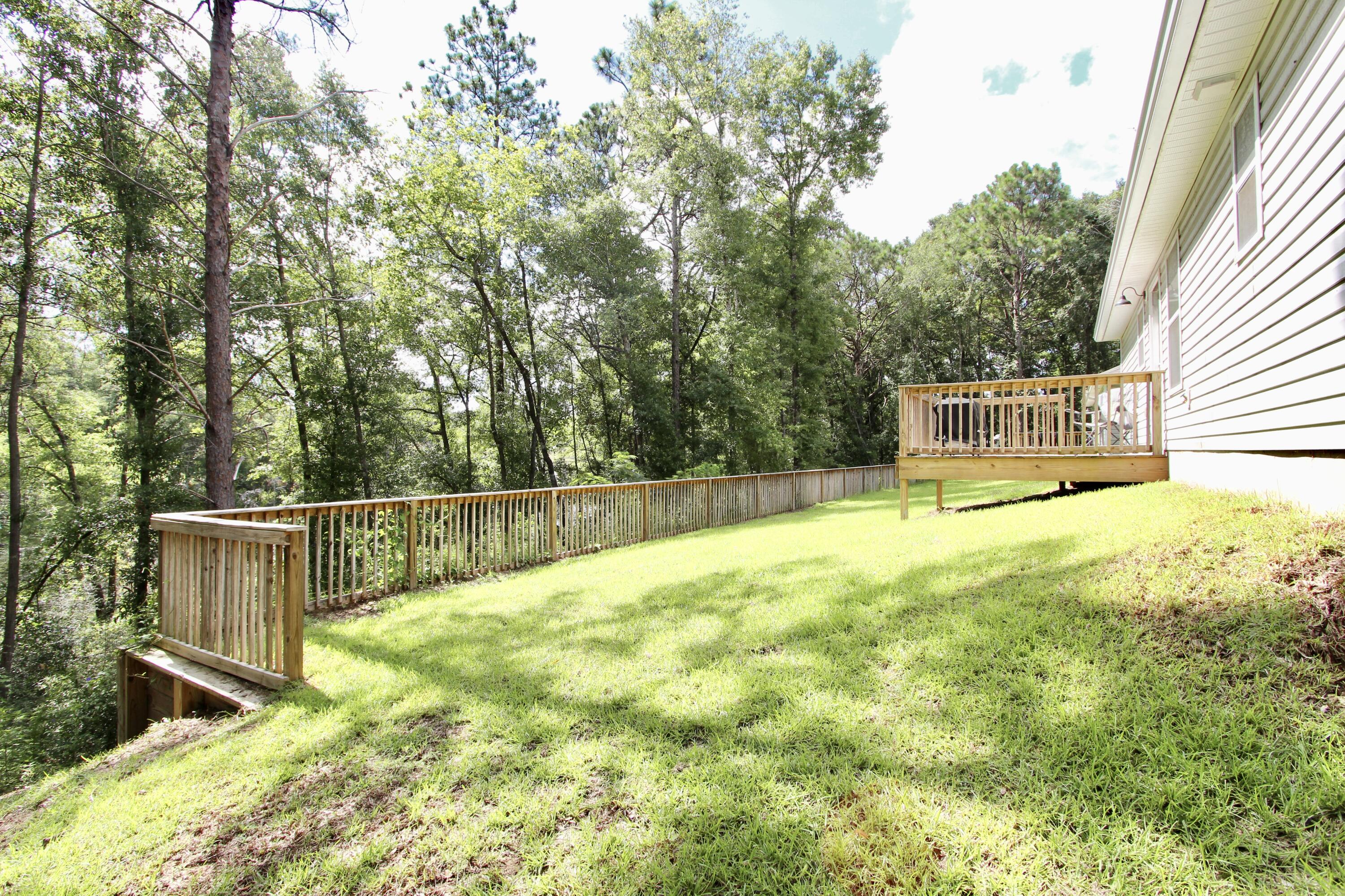 102 Windsor Drive Crestview, FL 32539 - Photo 26 of 26 a view of a backyard with swimming pool