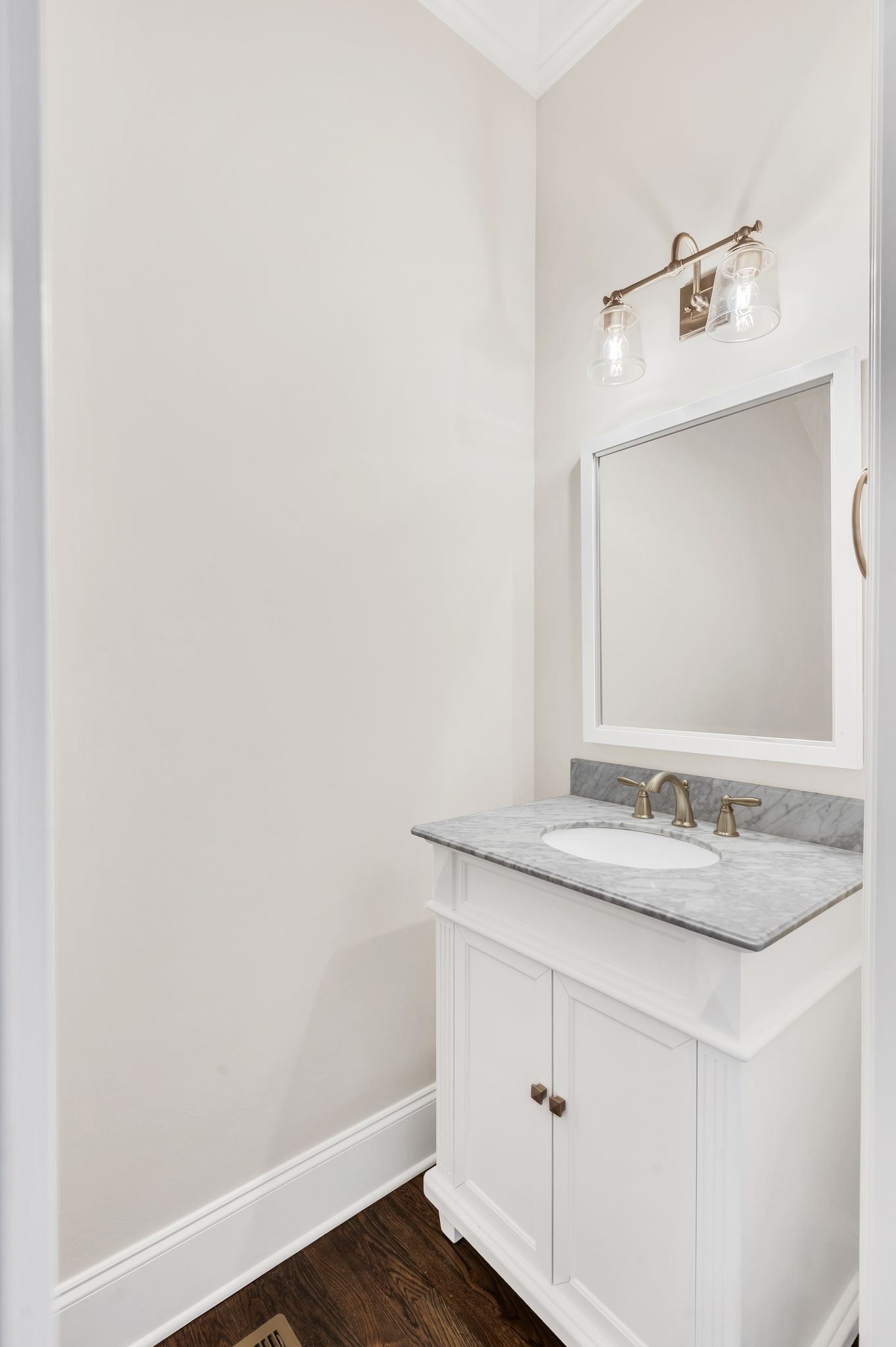 2000 Erwin Street Franklin, TN 37064 - Photo 16 of 97 a bathroom with a granite countertop sink and a mirror
