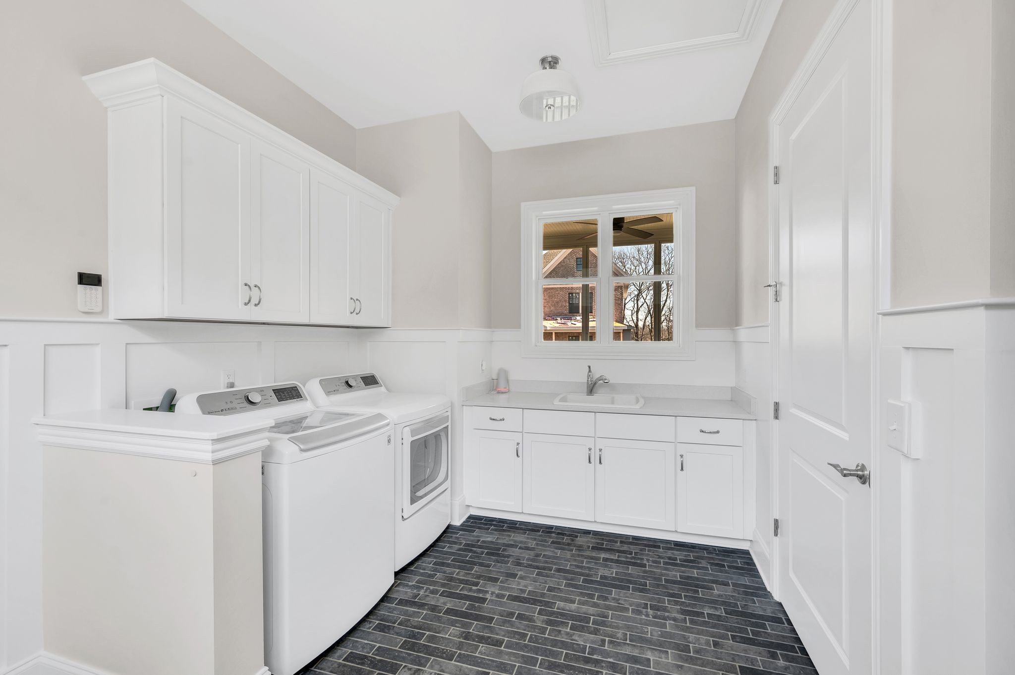 2000 Erwin Street Franklin, TN 37064 - Photo 24 of 97 a view of a sink and dishwasher with window
