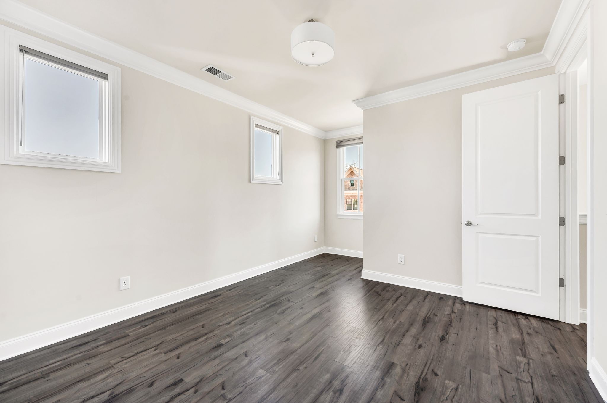 2000 Erwin Street Franklin, TN 37064 - Photo 28 of 97 a view of an empty room with wooden floor