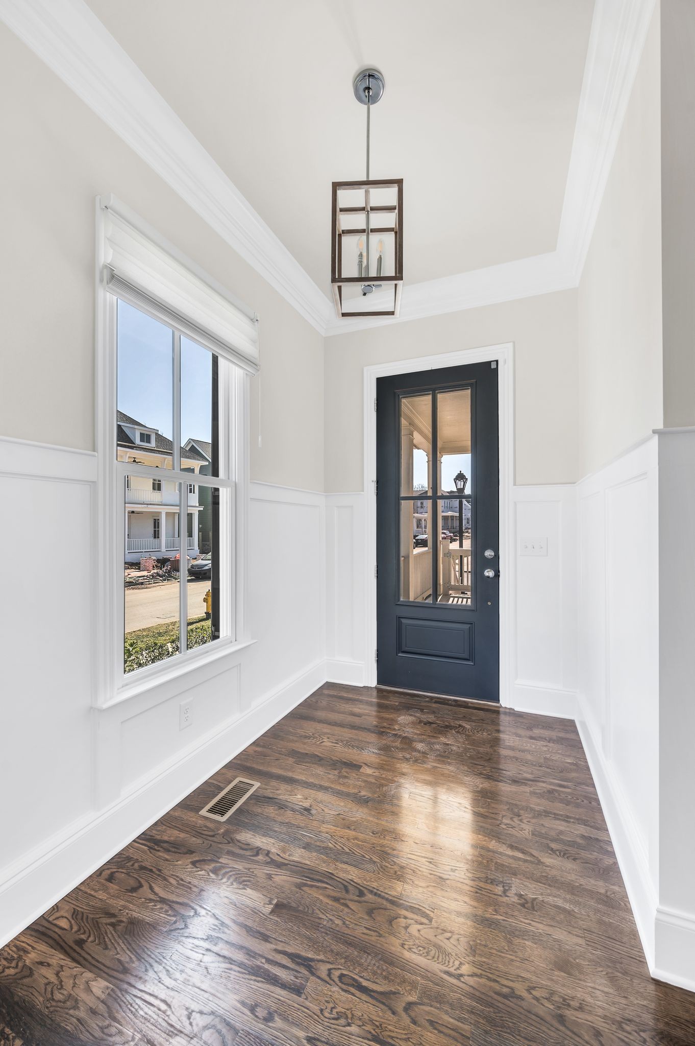 2000 Erwin Street Franklin, TN 37064 - Photo 6 of 97 a view of an empty room with a window and wooden floor