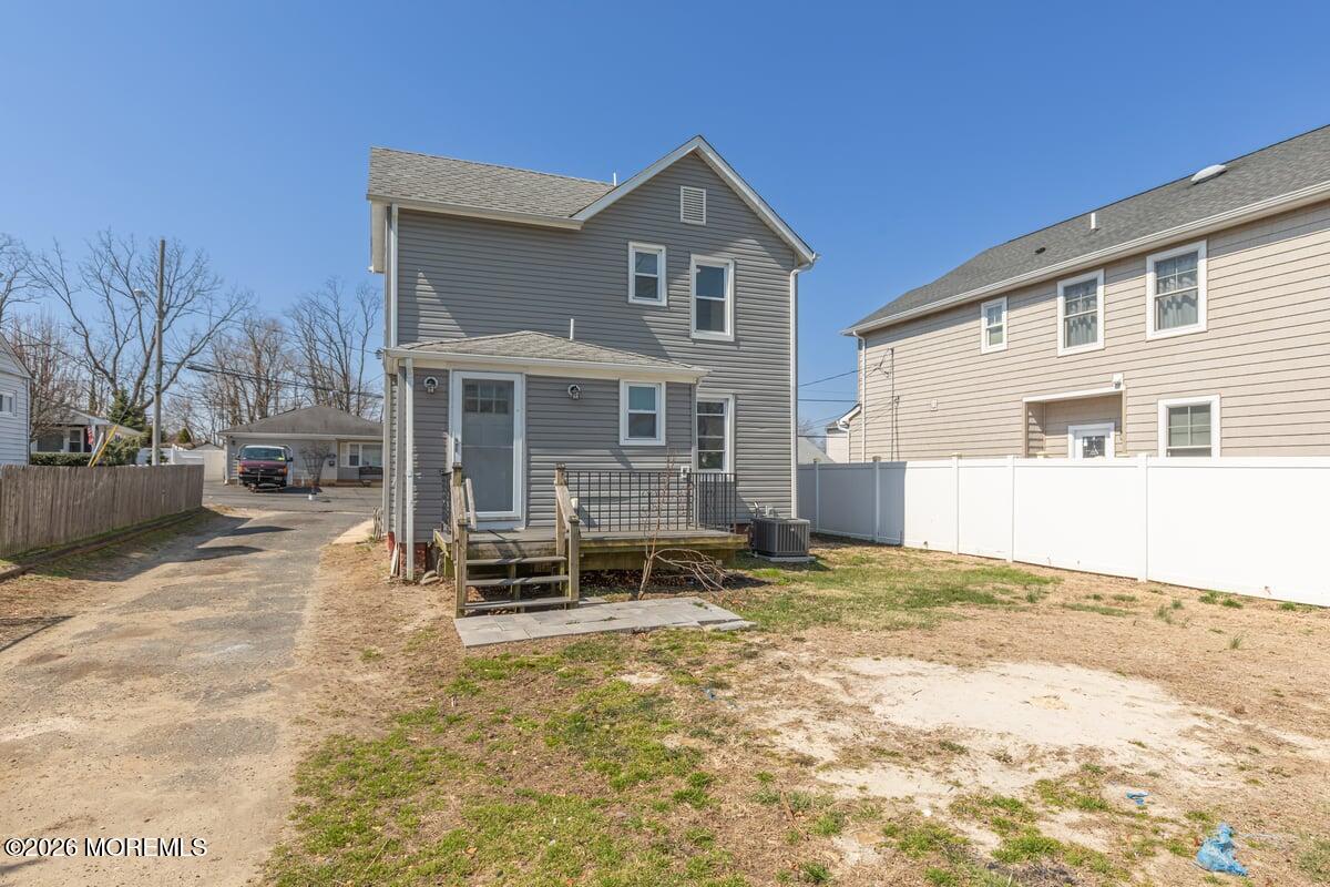 25 Howland Place Long Branch, NJ 07740 - Photo 12 of 13 a backyard of a house with yard and seating space