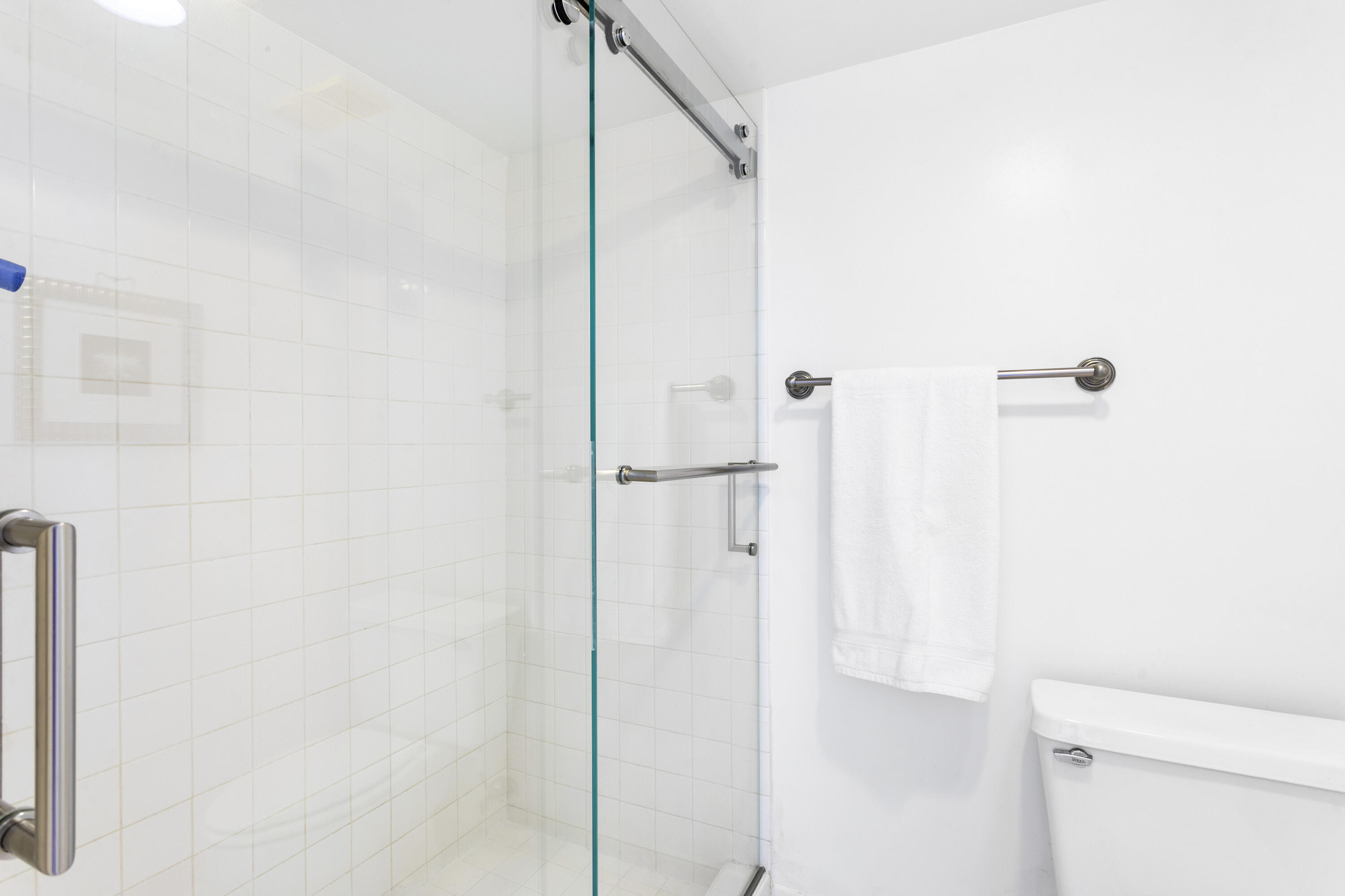 100 Ocean Trail Way, Unit 501 Jupiter, FL 33477 - Photo 16 of 30 a bathroom with a shower and a toilet