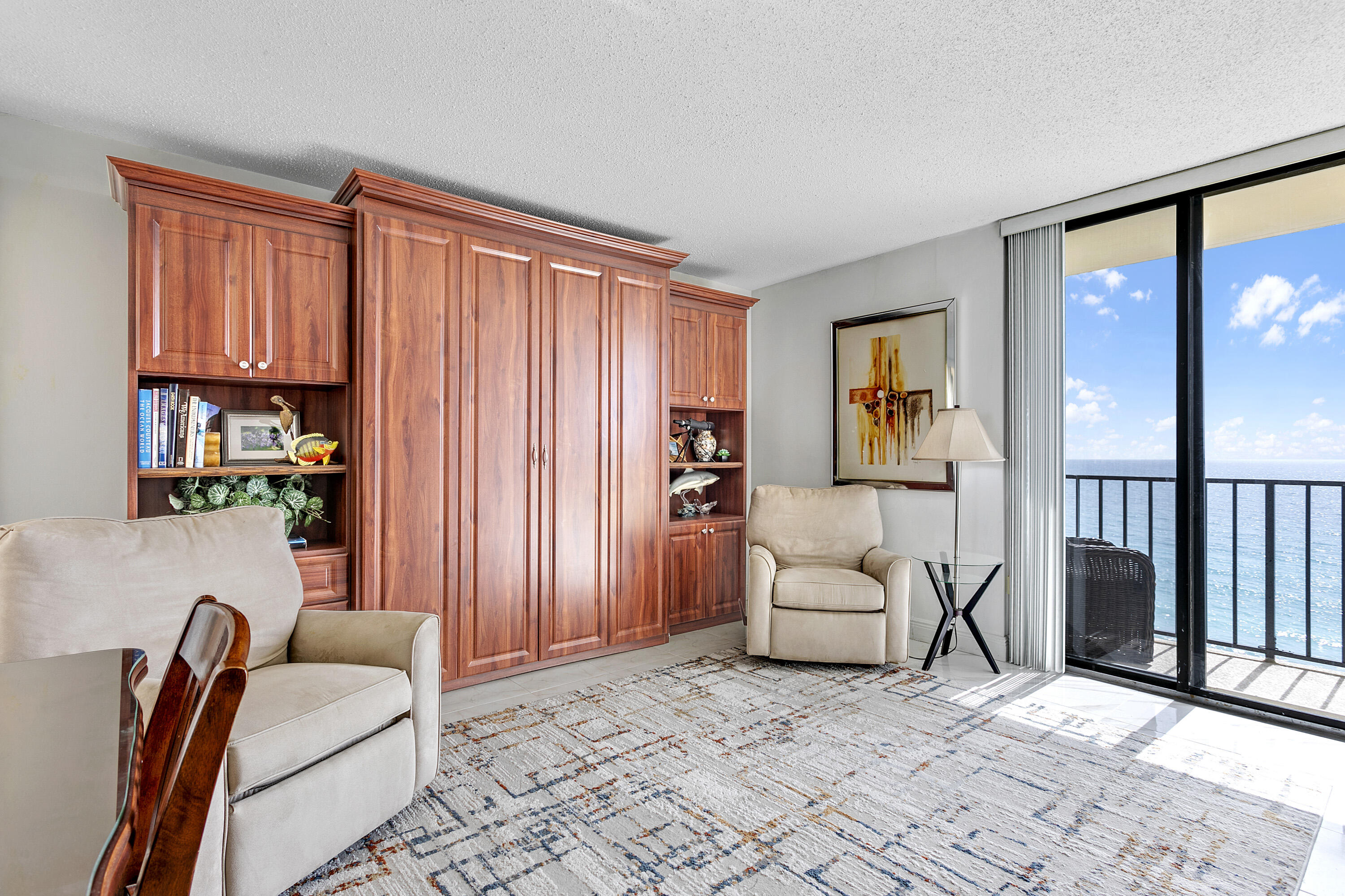 100 Ocean Trail Way, Unit 501 Jupiter, FL 33477 - Photo 17 of 30 a bedroom with furniture and a window