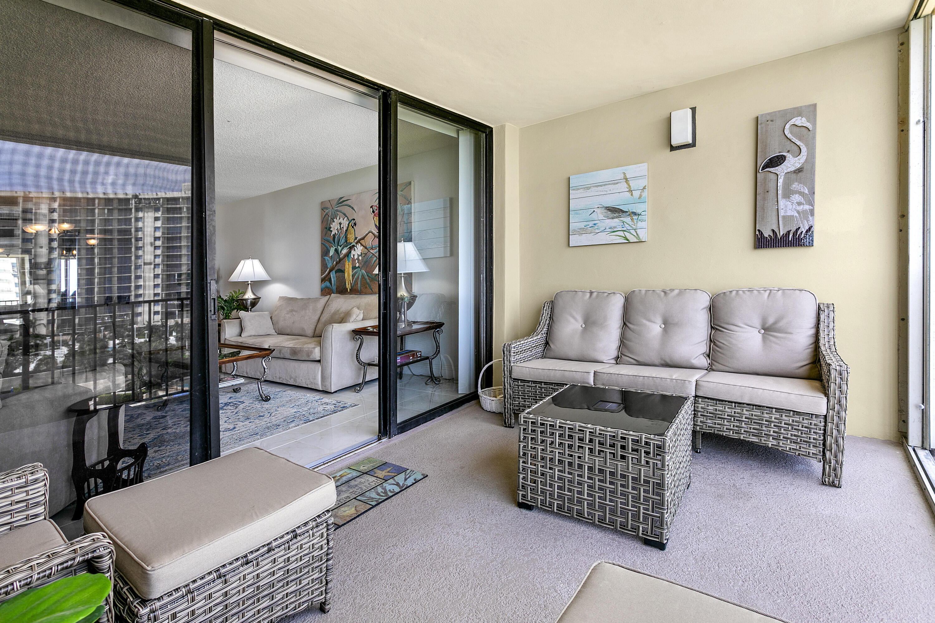 100 Ocean Trail Way, Unit 501 Jupiter, FL 33477 - Photo 20 of 30 a living room with furniture rug and window