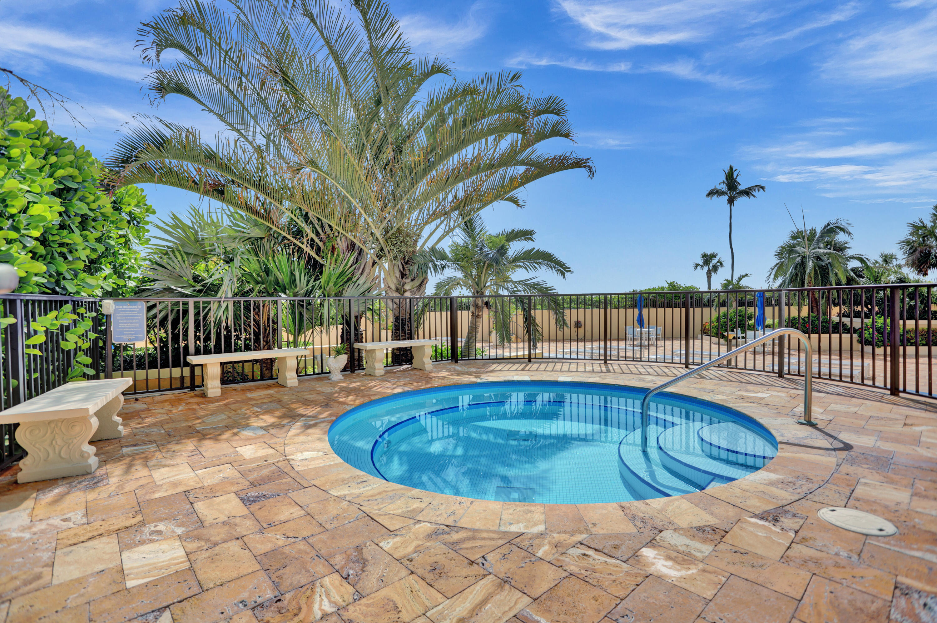 100 Ocean Trail Way, Unit 501 Jupiter, FL 33477 - Photo 27 of 30 a view of a swimming pool with a patio