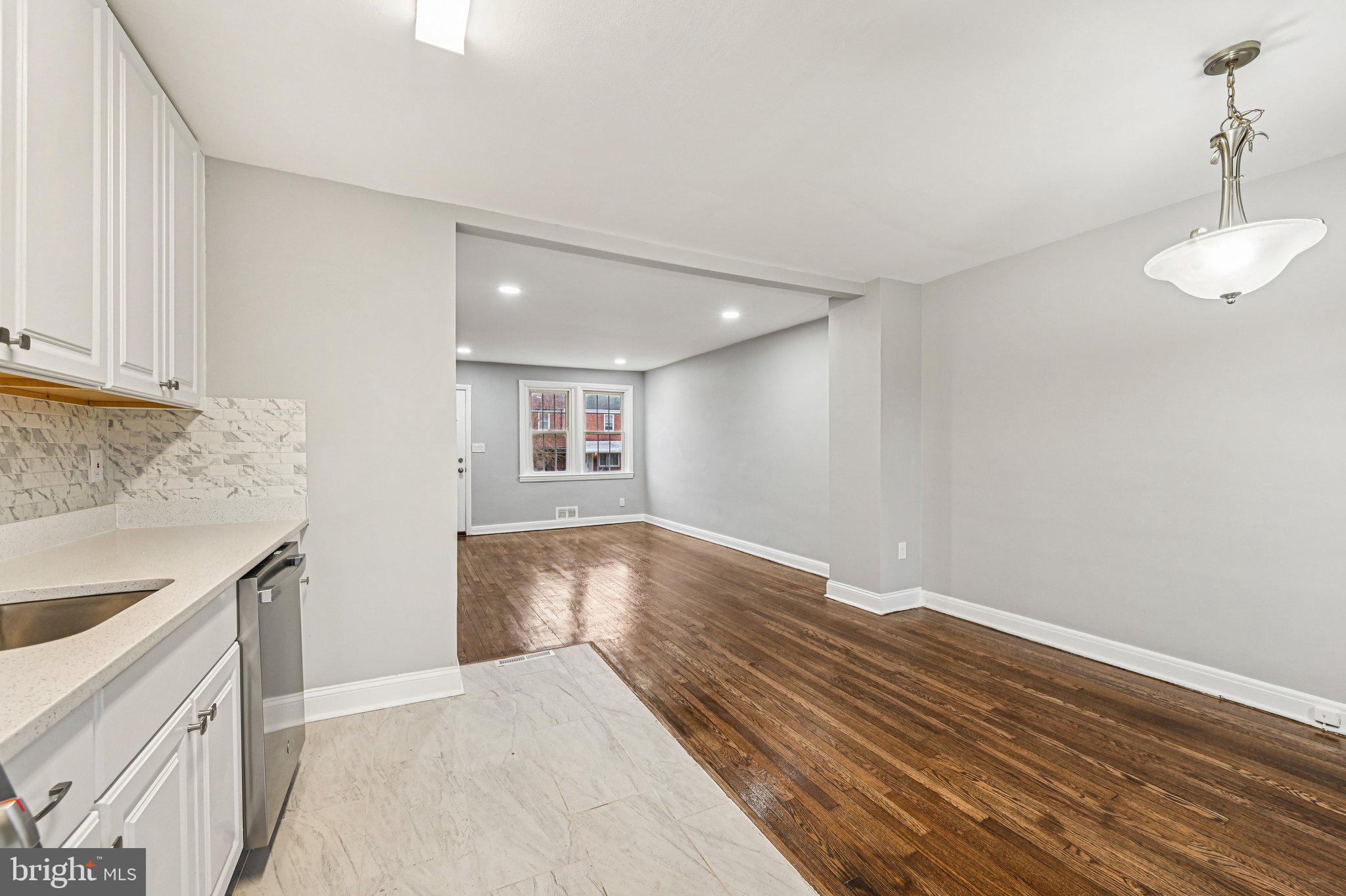 38 Upmanor Road Baltimore, MD 21229 - Photo 11 of 35 a view of kitchen and utility room