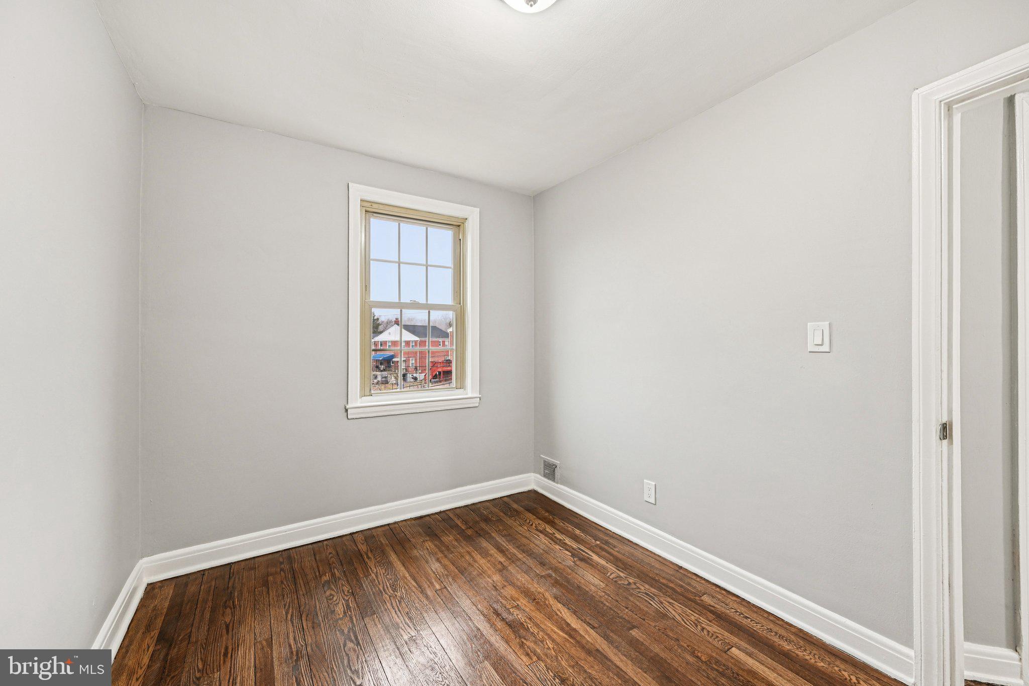 38 Upmanor Road Baltimore, MD 21229 - Photo 23 of 35 an empty room with a window