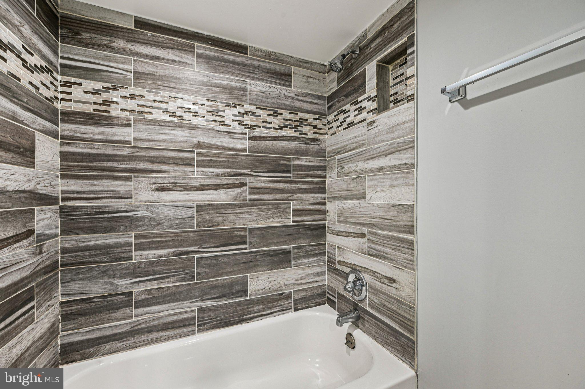 38 Upmanor Road Baltimore, MD 21229 - Photo 32 of 35 a bathroom with a shower