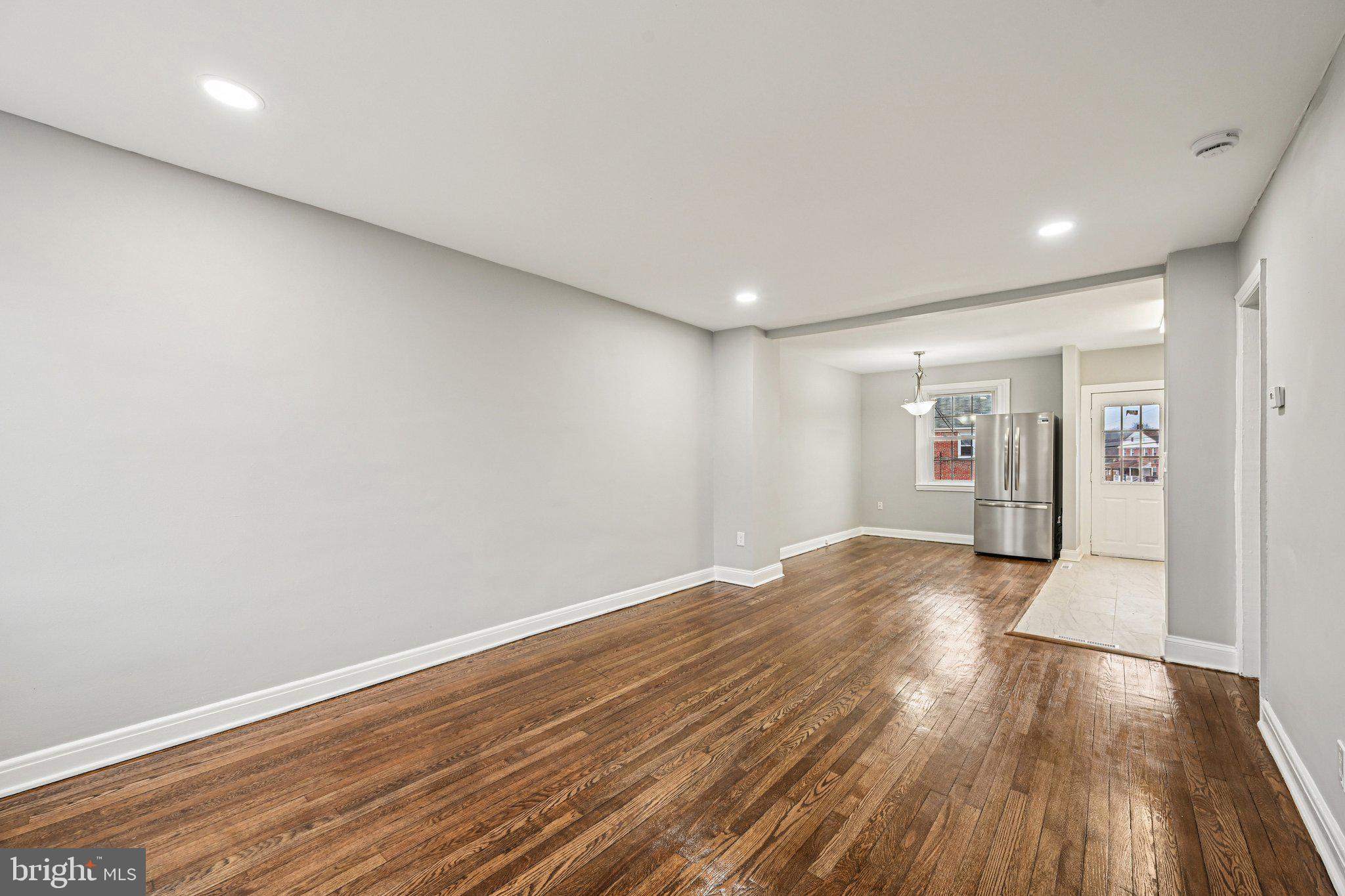 38 Upmanor Road Baltimore, MD 21229 - Photo 5 of 35 a view of livingroom with wooden floor