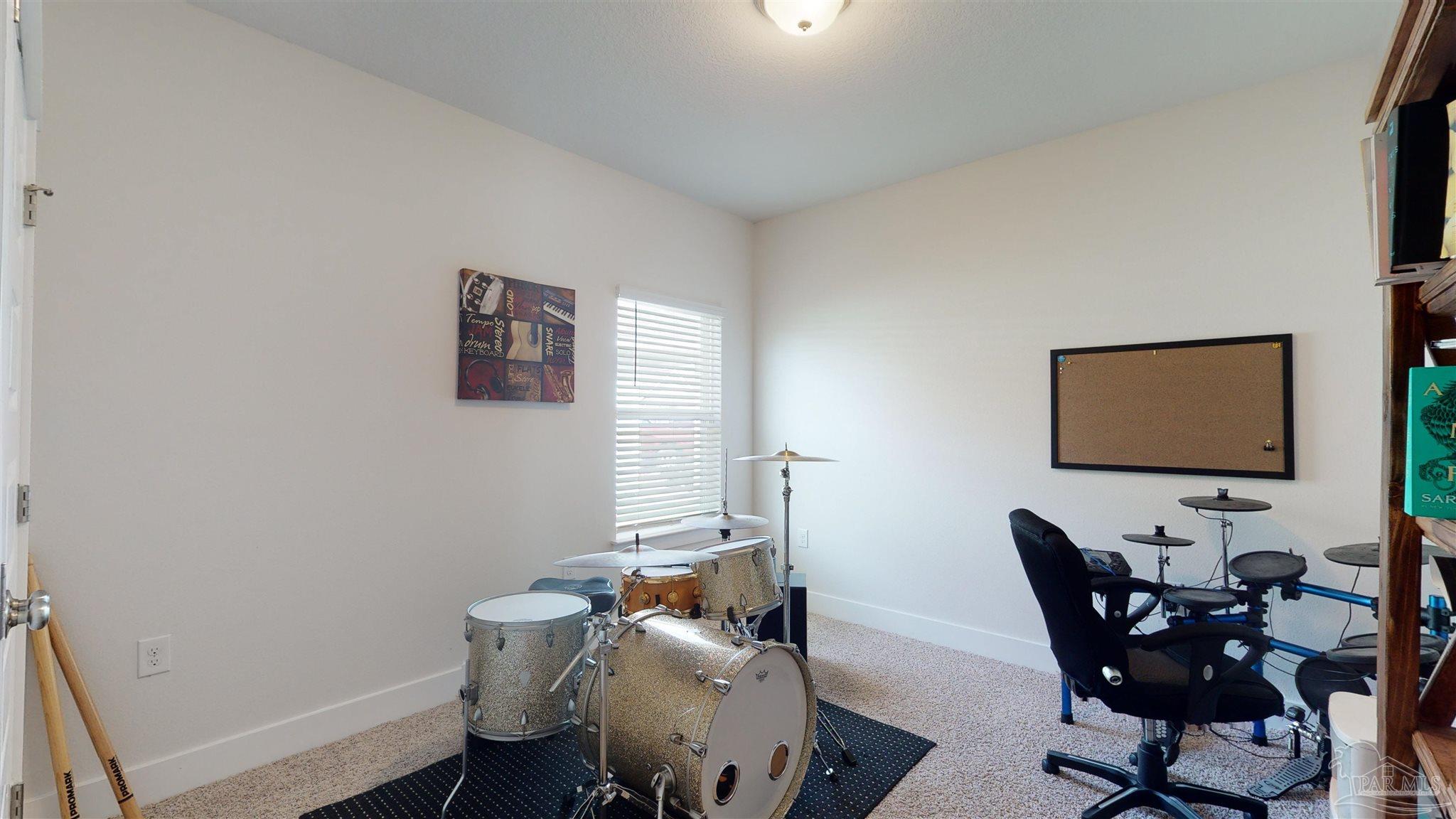 5789 Conley Court Milton, FL 32571 - Photo 38 of 50 a view of a workspace with furniture and wooden floor