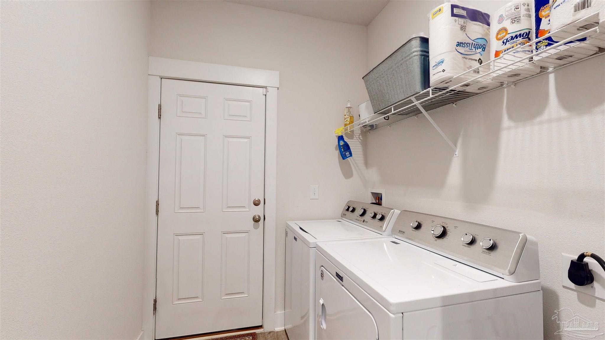 5789 Conley Court Milton, FL 32571 - Photo 41 of 50 a utility room with dryer and washer