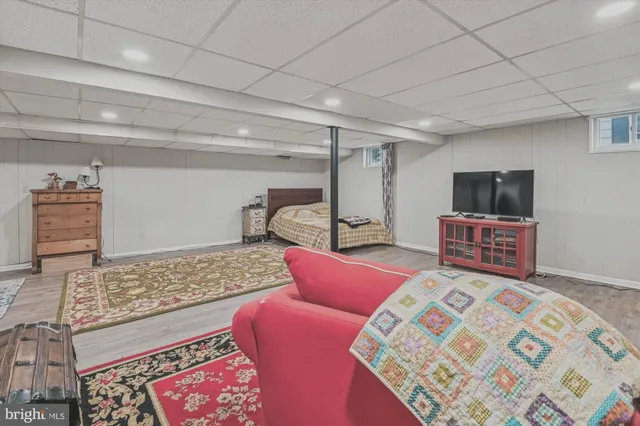 a view of a wooden deck with a yard