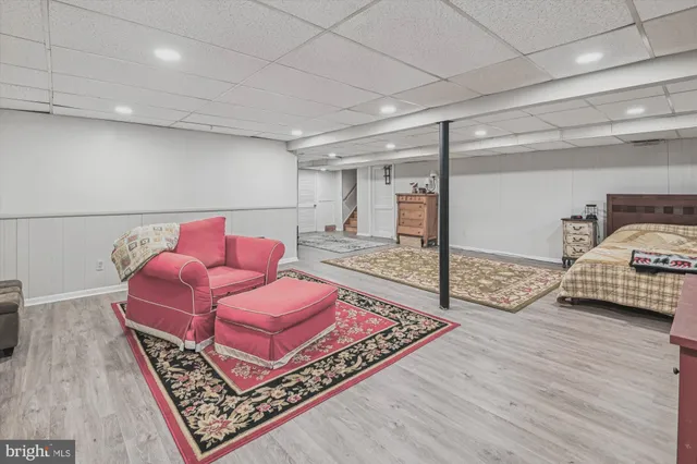 a view of a house with a wooden deck