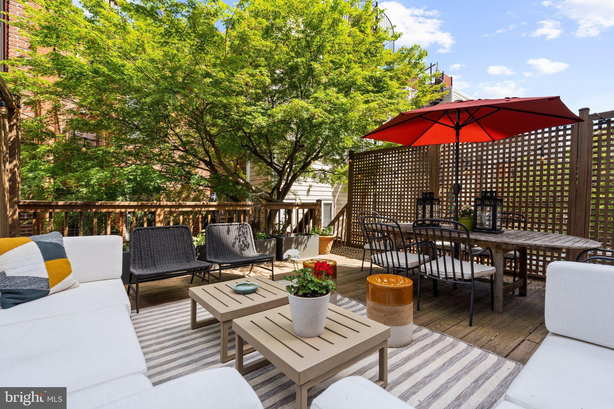 2026 15th Street Northwest Washington, DC 20009 - Photo 38 of 47 an outdoor sitting area with furniture
