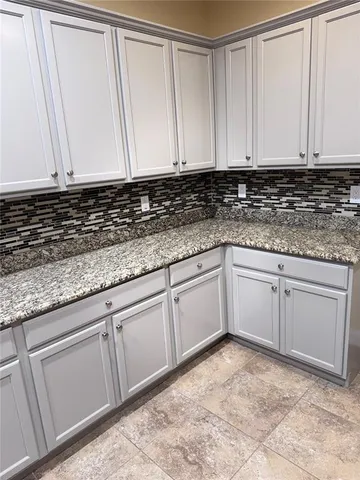 a living room with furniture and window