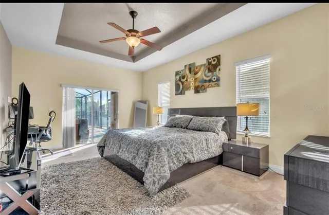 a bed room with a bed and a dresser