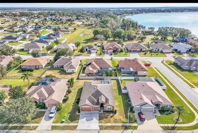 an aerial view of a house with a garden