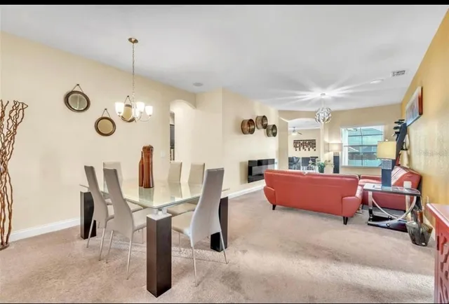a view of a dining room with furniture