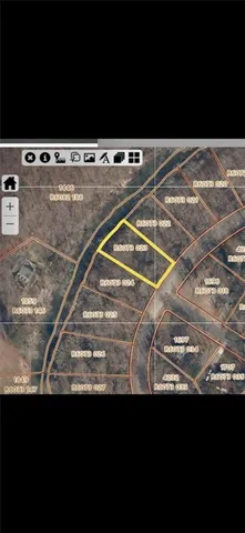 a sitting area with wooden floor