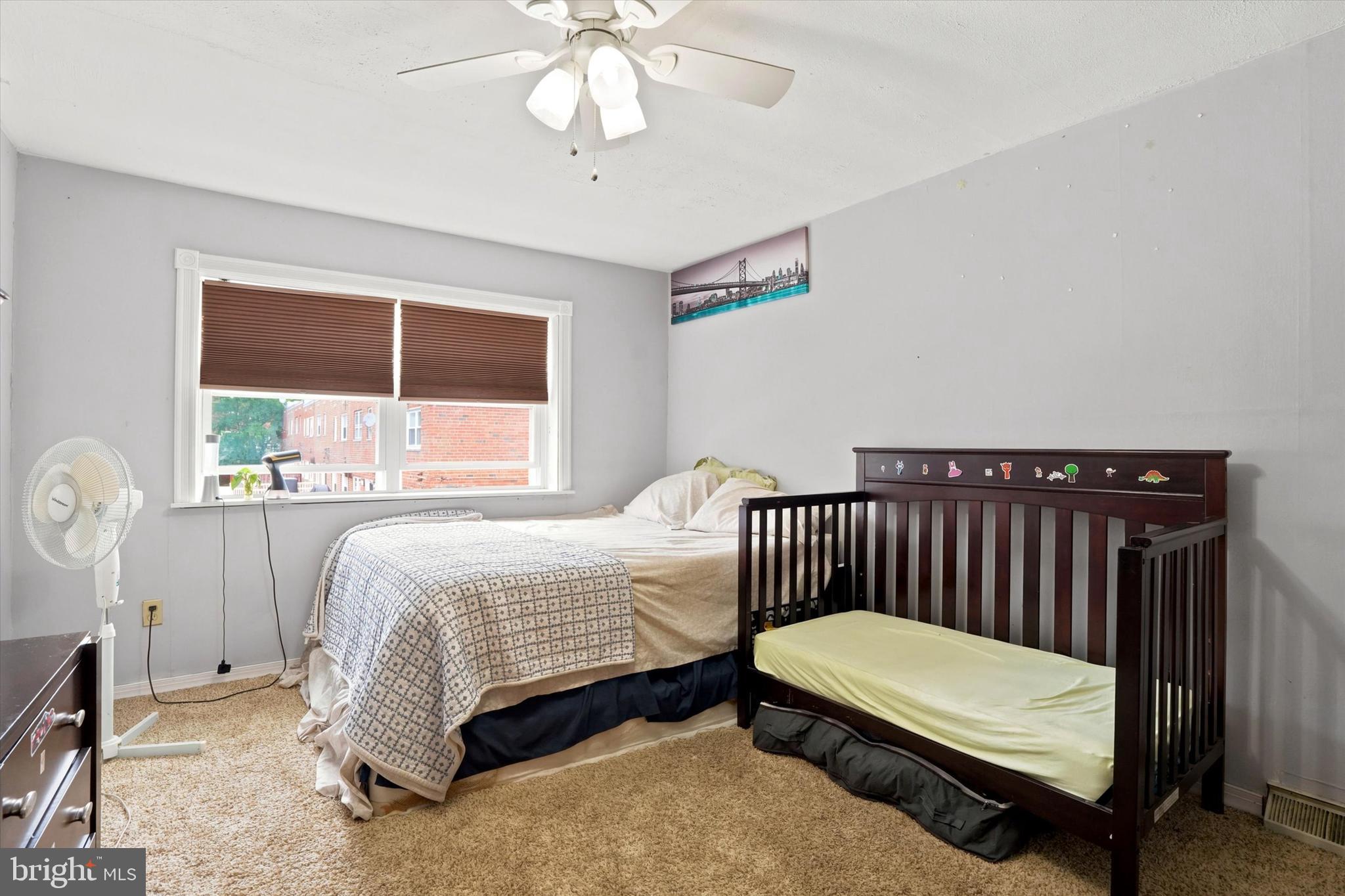 3435 Vinton Road Philadelphia, PA 19154 - Photo 15 of 25 a bedroom with a bed and a window