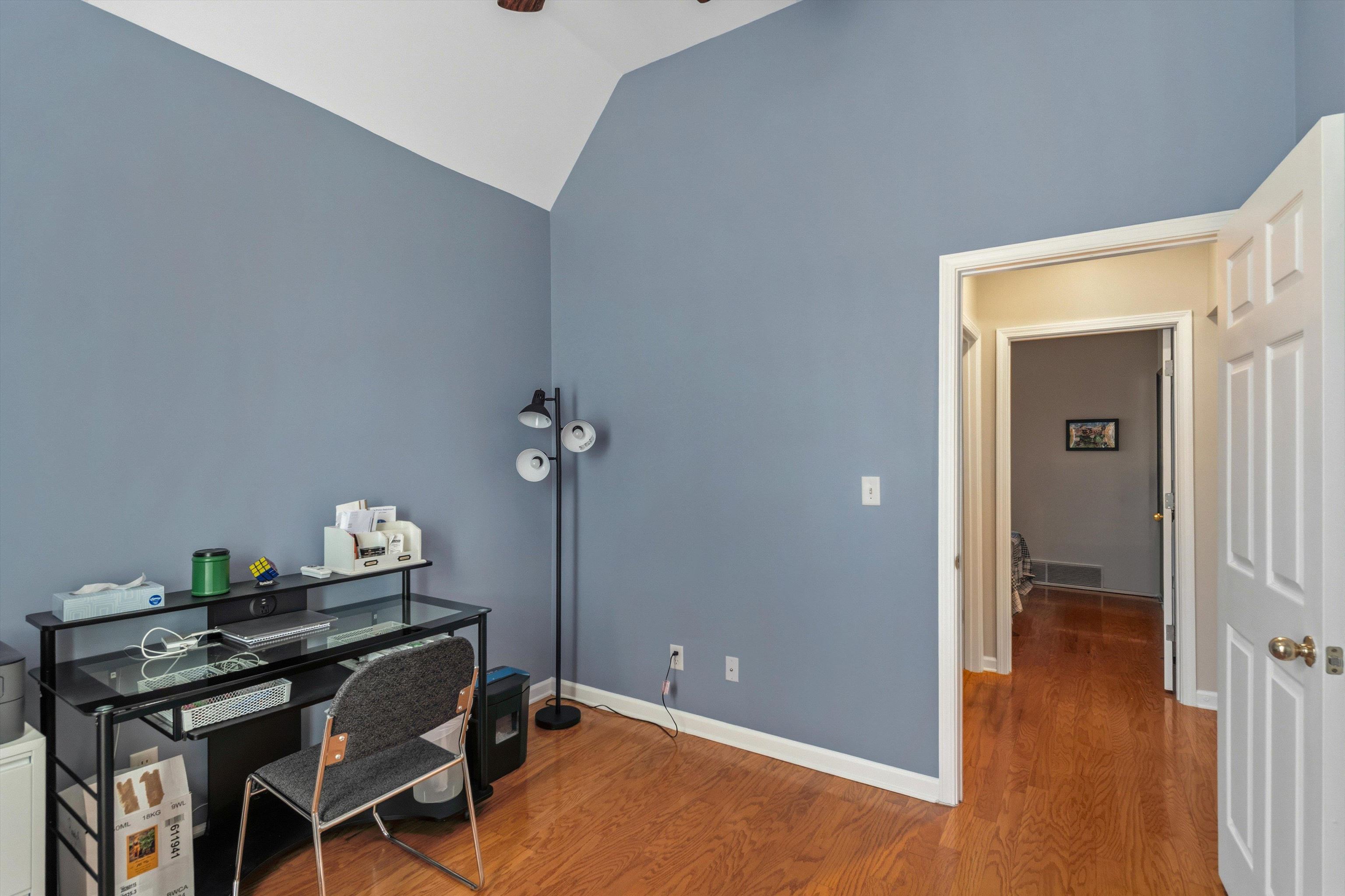 10496 Ashfarm Way Collierville, TN 38017 - Photo 19 of 29 a workspace with furniture and wooden floor