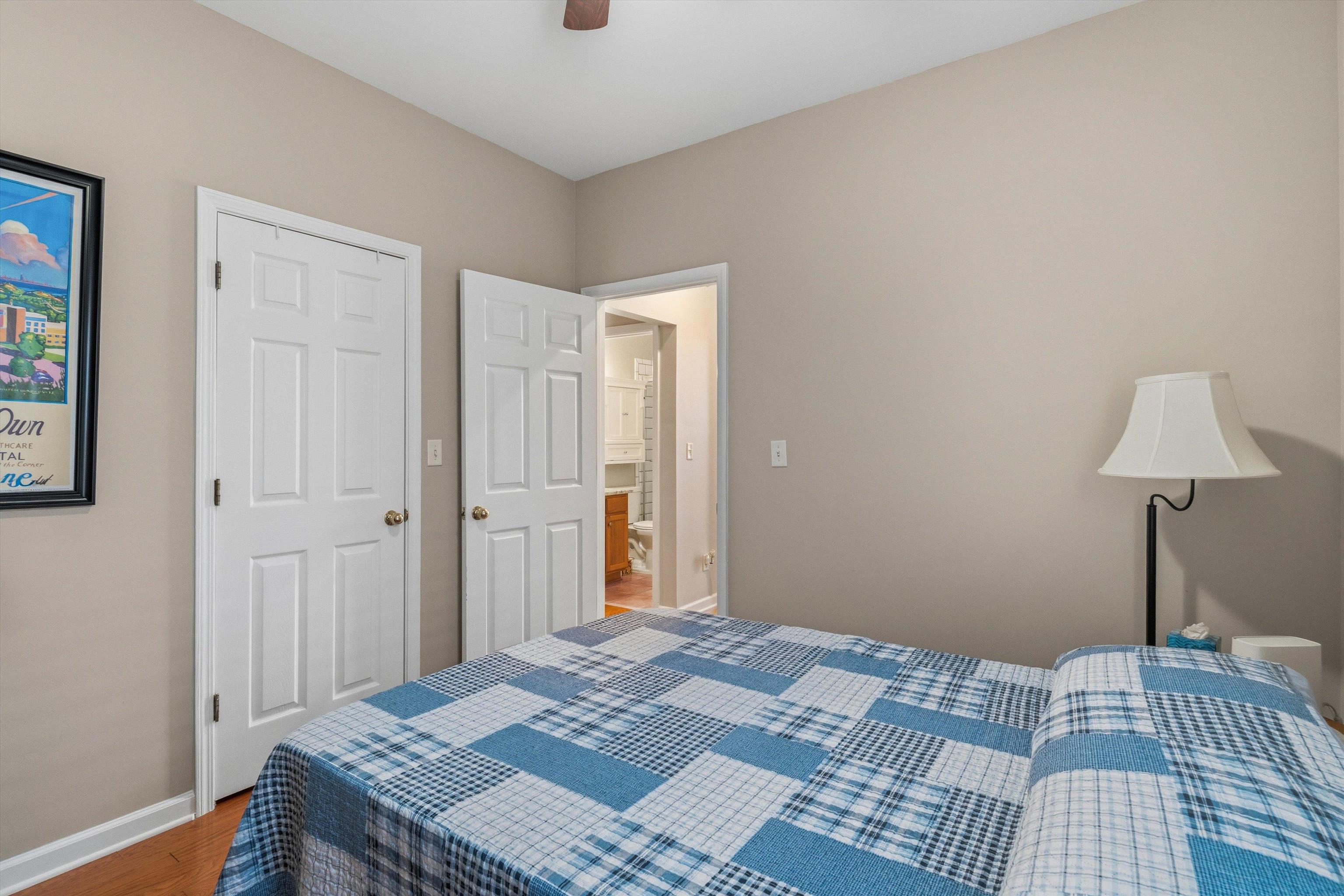 10496 Ashfarm Way Collierville, TN 38017 - Photo 22 of 29 a bedroom with a bed and a table