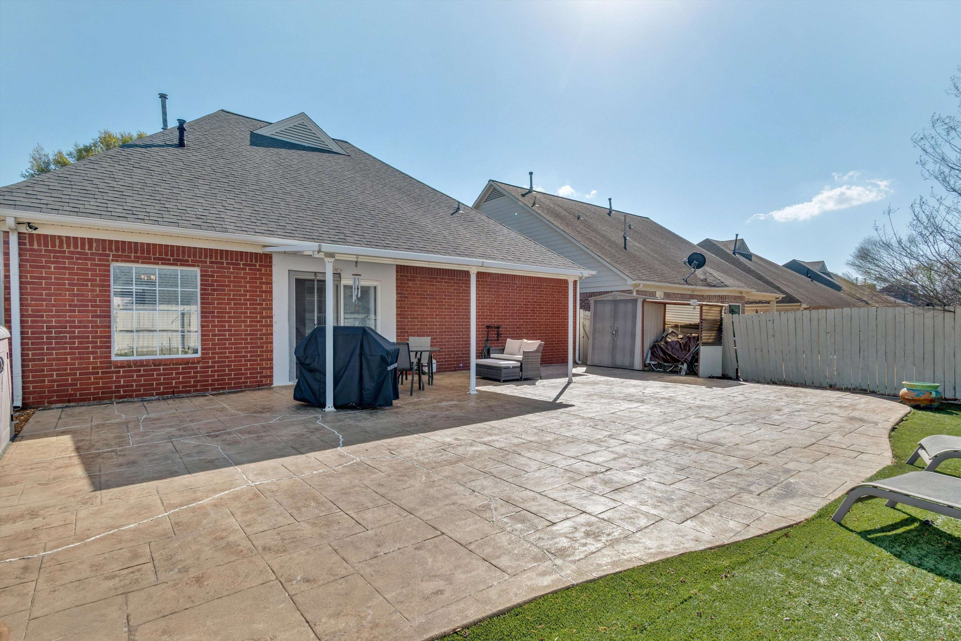 10496 Ashfarm Way Collierville, TN 38017 - Photo 27 of 29 a front view of house with yard outdoor seating and barbeque oven