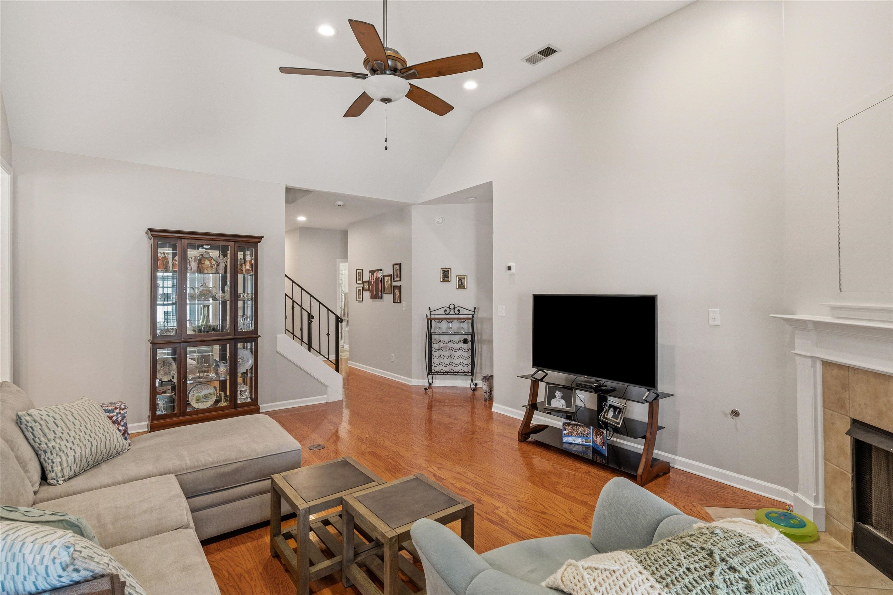 10496 Ashfarm Way Collierville, TN 38017 - Photo 5 of 29 a living room with furniture and a flat screen tv