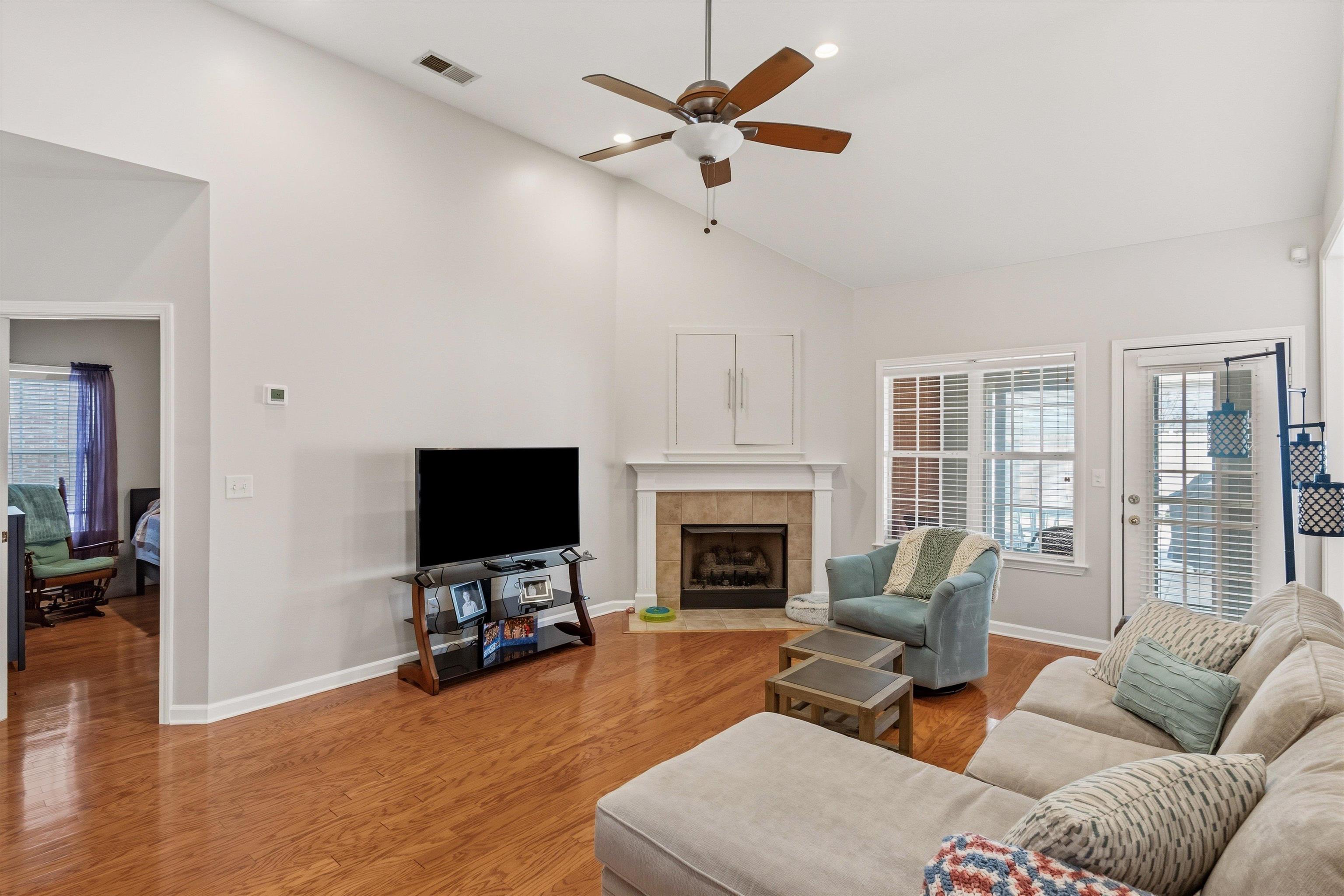 10496 Ashfarm Way Collierville, TN 38017 - Photo 6 of 29 a living room with furniture and a fireplace