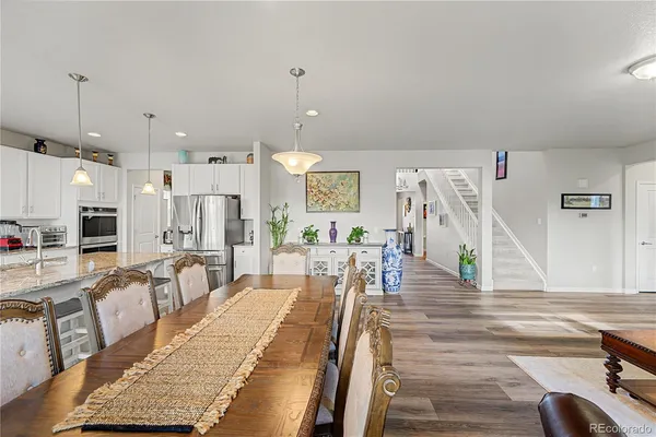 a view of a living room and dining room