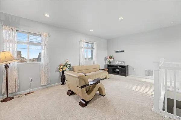a room with furniture and windows
