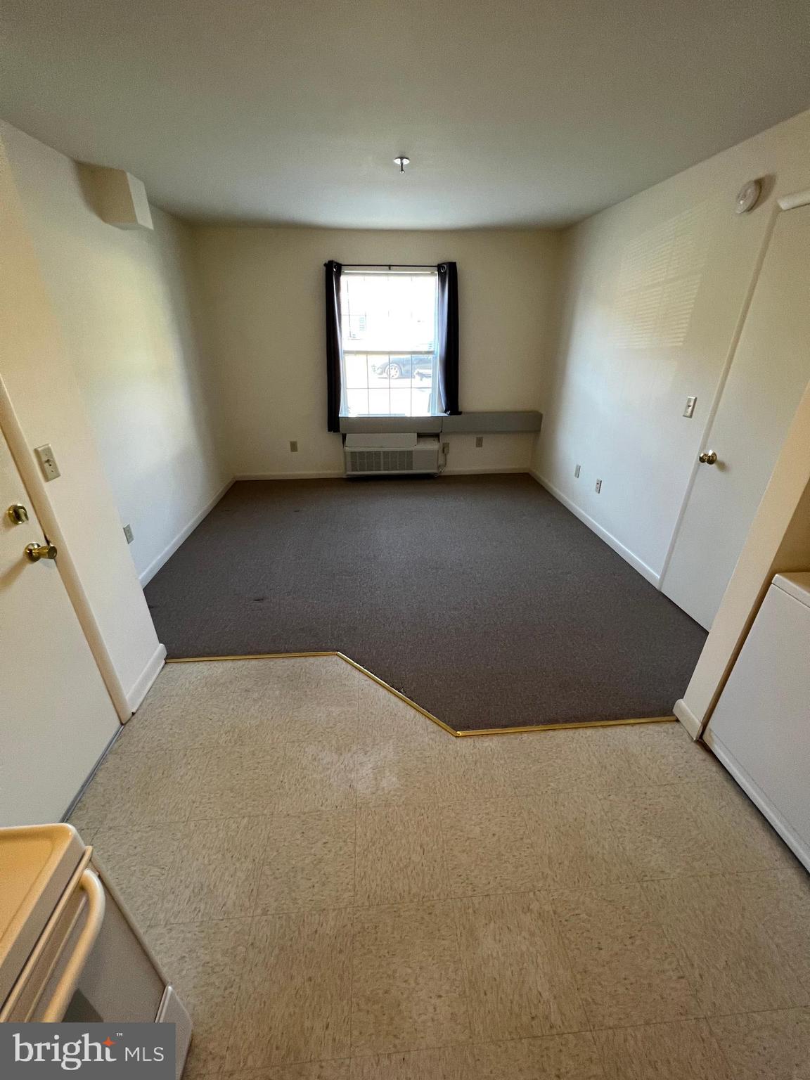 308 Broadway Street, Unit 101 Quantico, VA 22134 - Photo 4 of 6 an empty room with a window