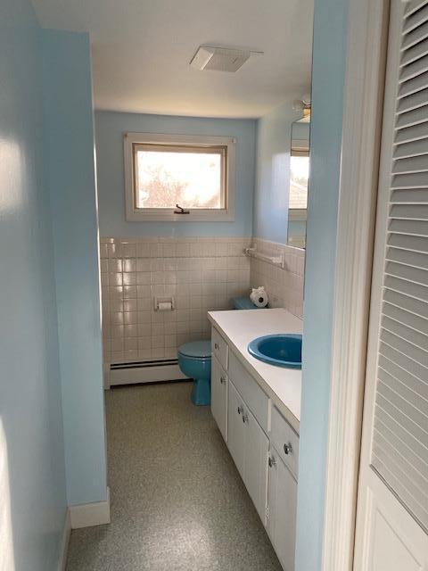 119 Sheaffer Road Centerville, MA 02632 - Photo 17 of 24 a bathroom with a granite countertop sink a toilet and a mirror