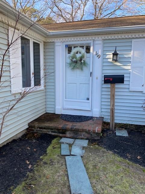 119 Sheaffer Road Centerville, MA 02632 - Photo 6 of 24 a view of a house with a yard