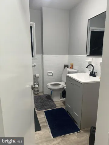 a bathroom with a sink and a toilet