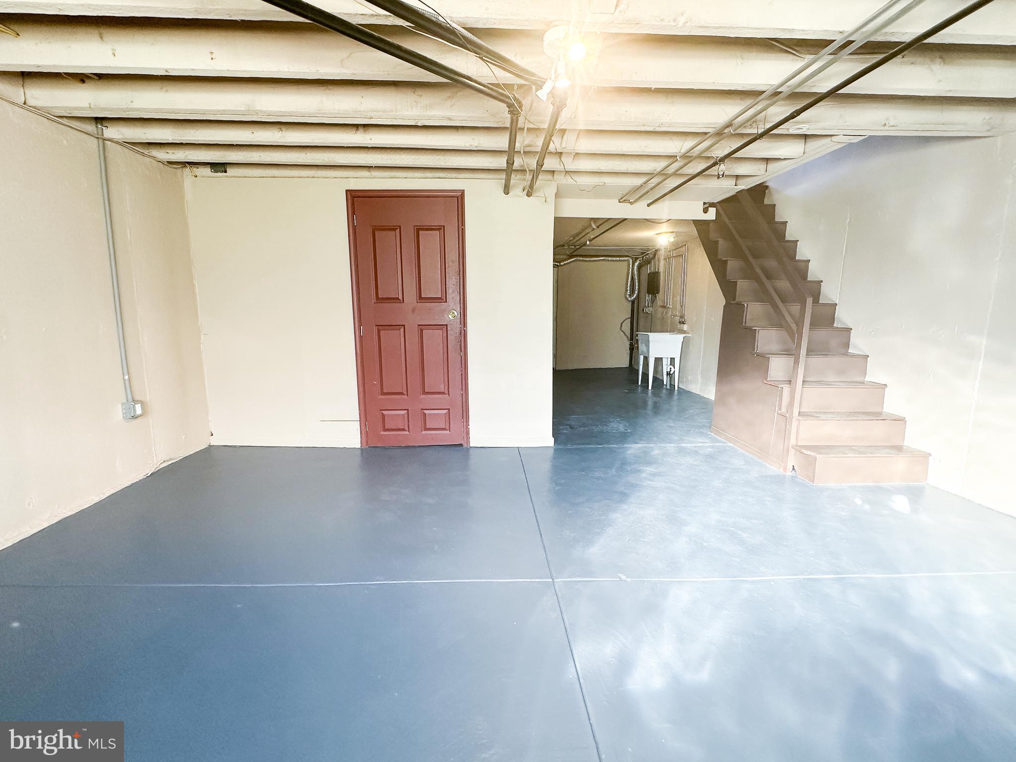 7408 Rugby Street Philadelphia, PA 19138 - Photo 26 of 33 Basement/Laundry Area and Garage/Exterior Access
