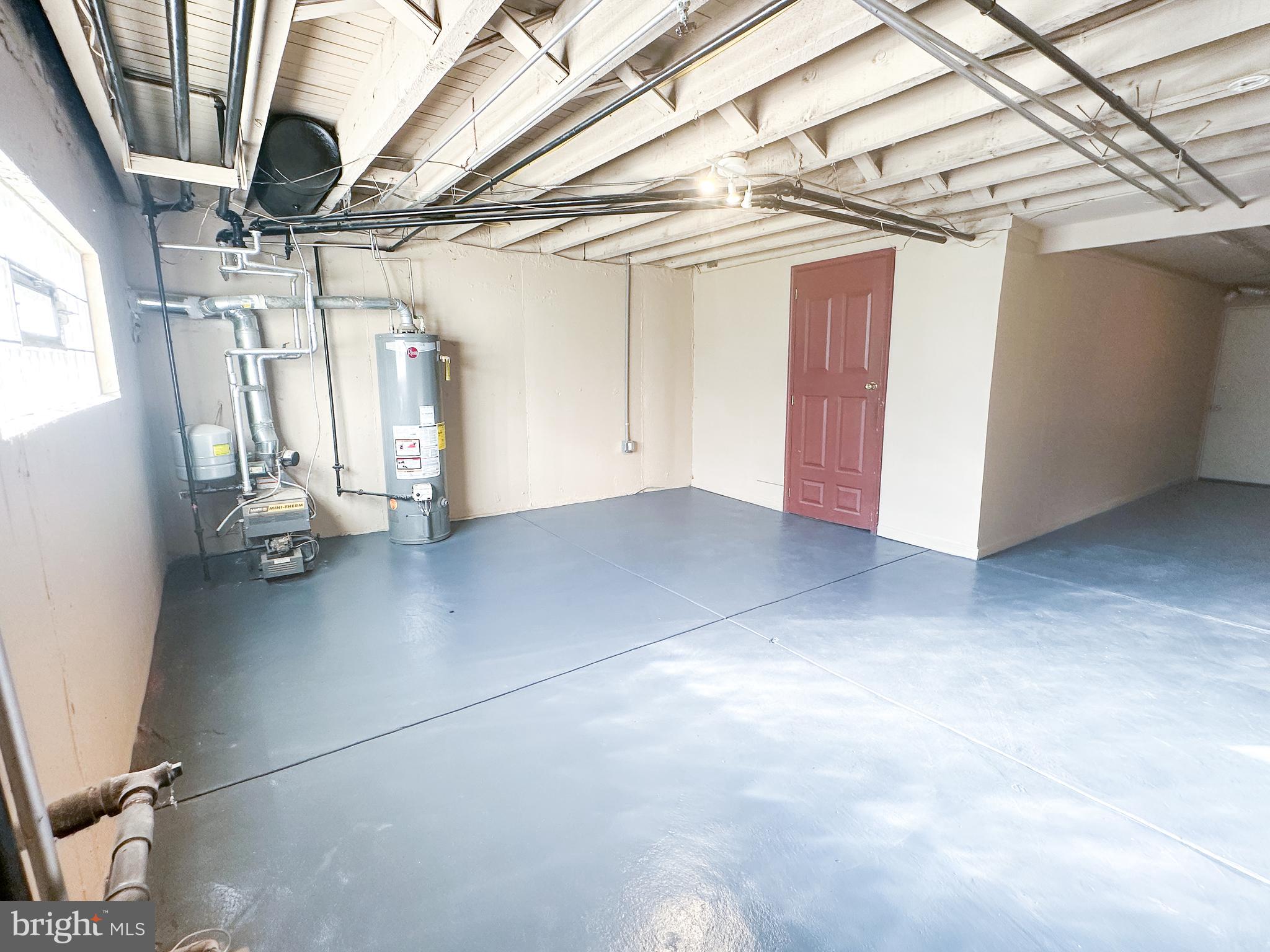 7408 Rugby Street Philadelphia, PA 19138 - Photo 27 of 33 Basement/Laundry Area and Garage/Exterior Access