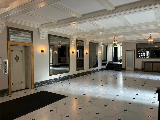 a view of a hallway with entryway